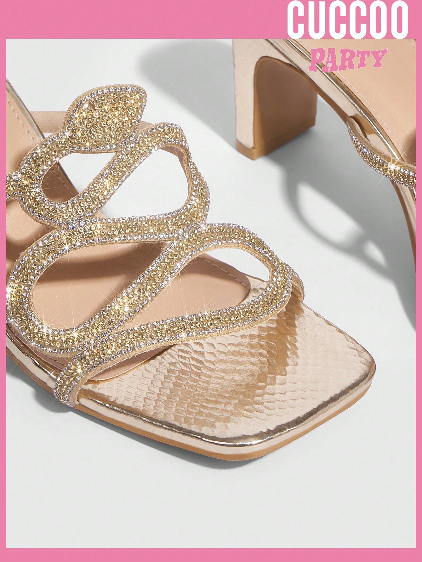 Fashionable open toe square heel sandals with snake shaped diamante strap for spring and summer prom shoes.