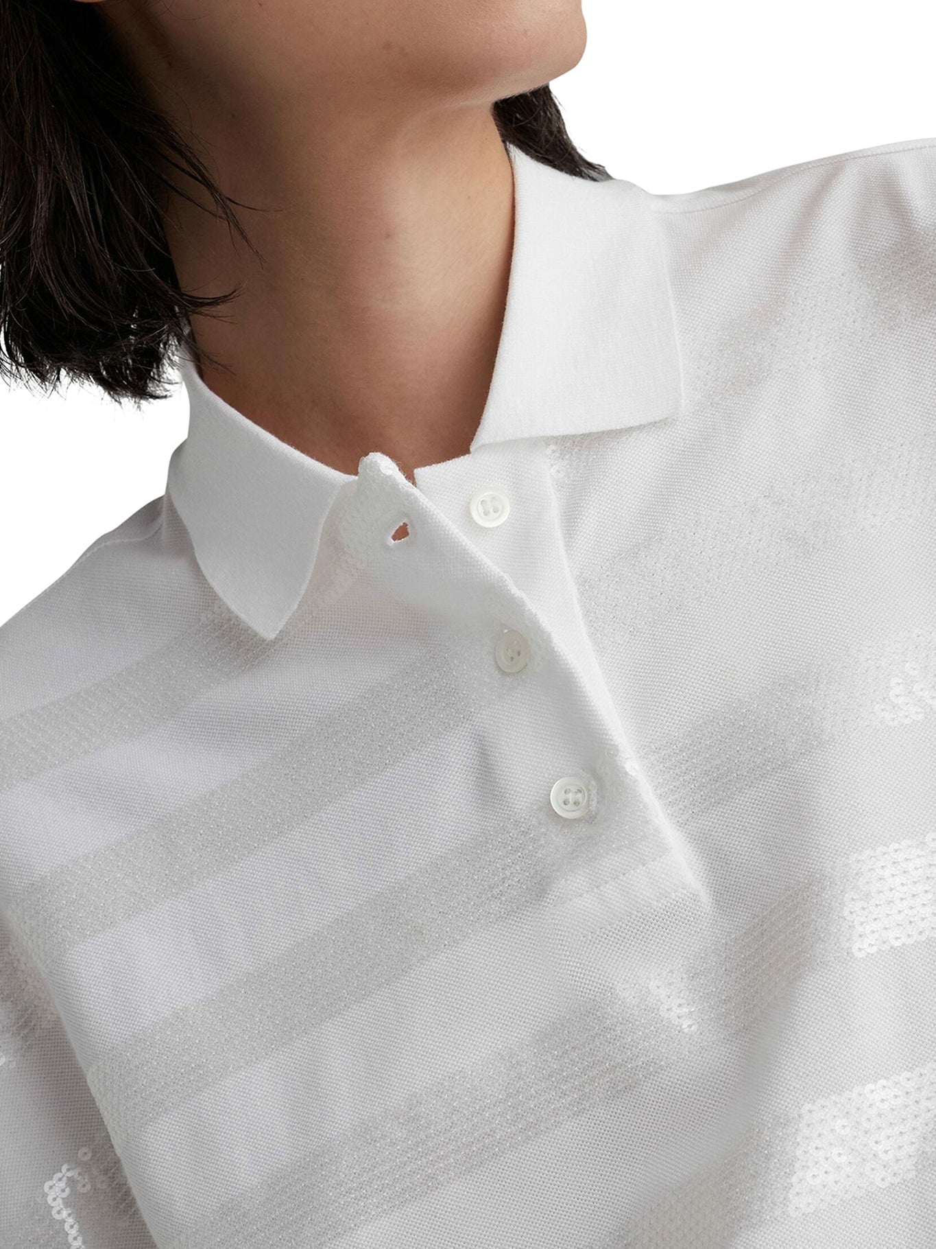 Sequin embellished polo shirt.