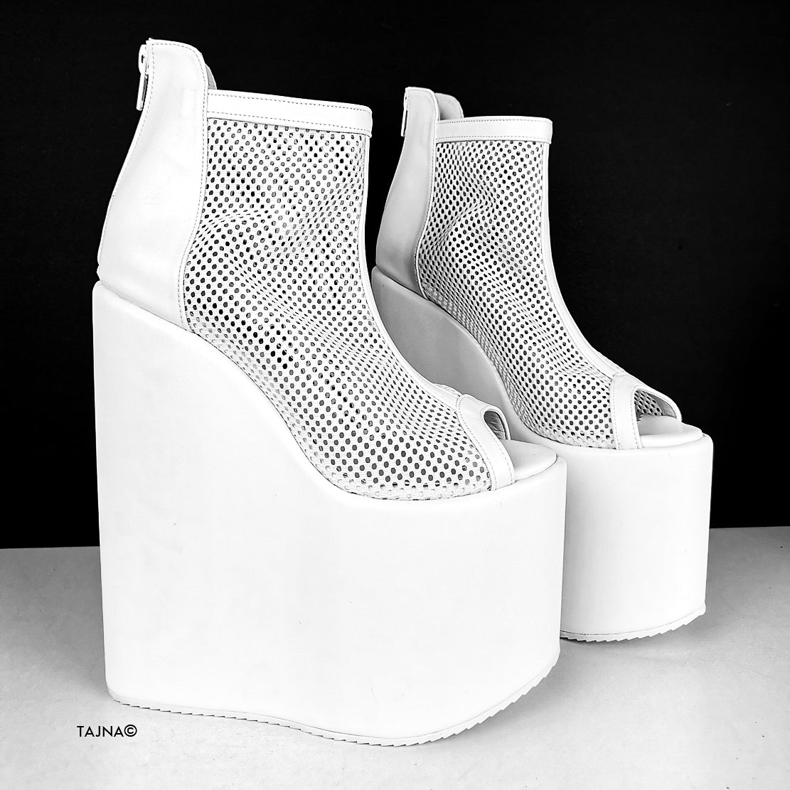 White Fishnet Wedge Boots.